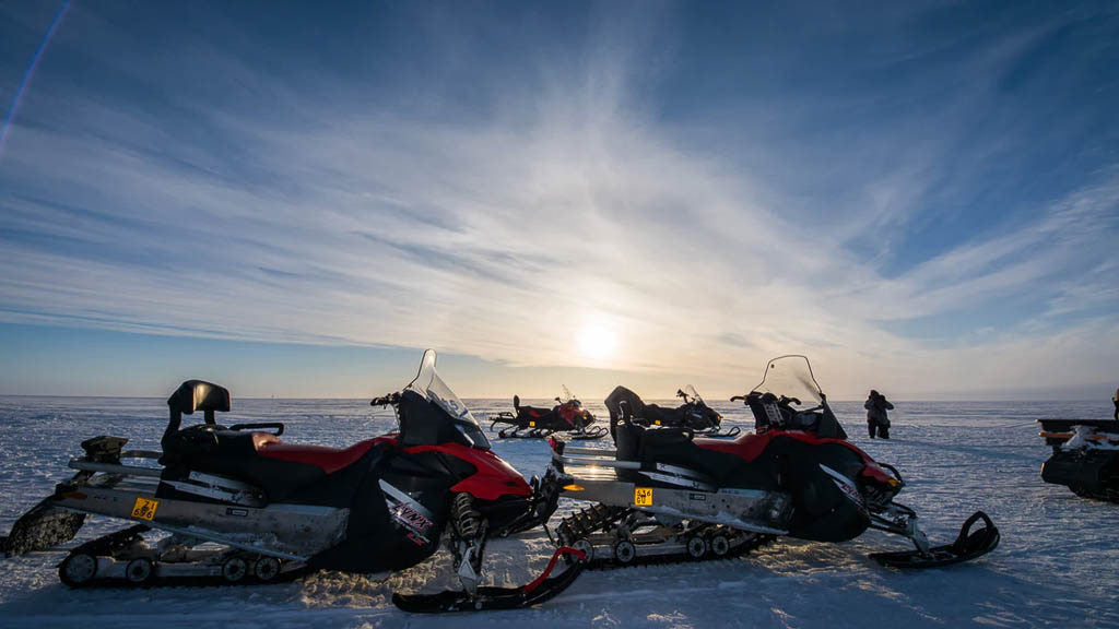 Snowmobiles on Ice Field, Lapland