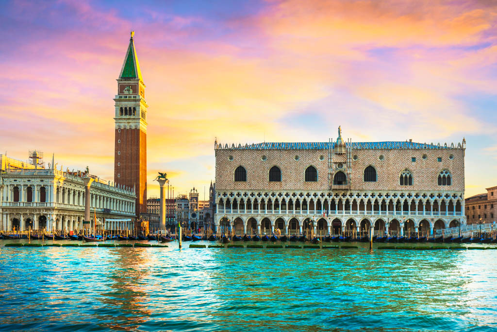 Venice landmark at dawn, view from sea of Piazza San Marco or st Mark square, Campanile and Ducale or Doge Palace. Italy, Europe.