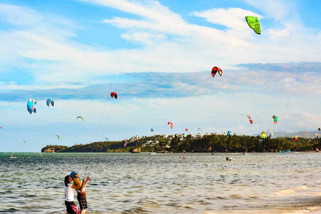 Boracay, Philippines - January 7, 2015: A tourist takes Kitesurfing lessons from a teacher on the shore in the island of Boracay.