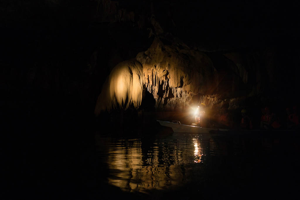 Unique inside view of Puerto Princesa subterranean underground river - Adventurous trip excursion in exclusive Philippines destination - Adventure travel concept to one new seven wonders of nature