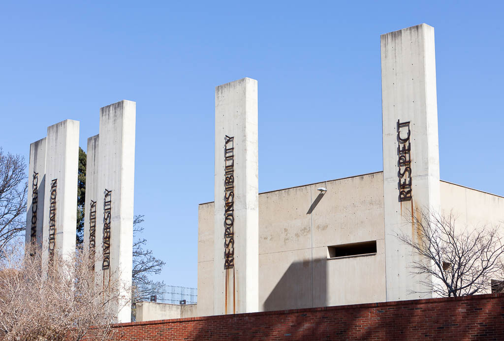 Johannesburg, South Africa - July, 17th 2011: Concrete pillars at the Apartheid Museum, depicting the words: responsibility, reconciliation, equality, diversity, responsibility and respect.