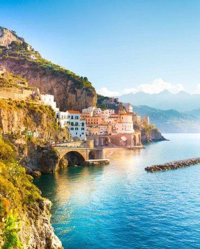 Morning view of Amalfi cityscape on coast line of mediterranean sea, Italy