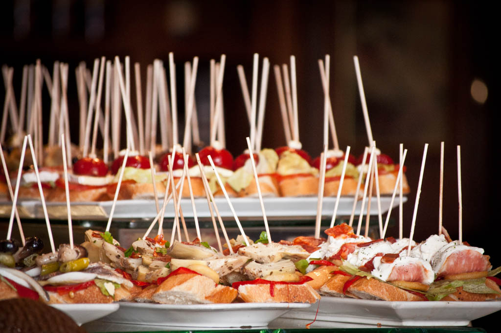 Exhibitor pinchos and tapas in a typical restaurant in Spain.