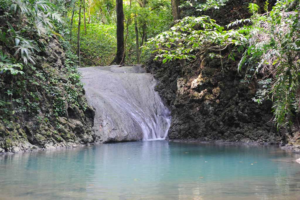 Waterfalls of siete altares on the forest at Livingston on Guatemala