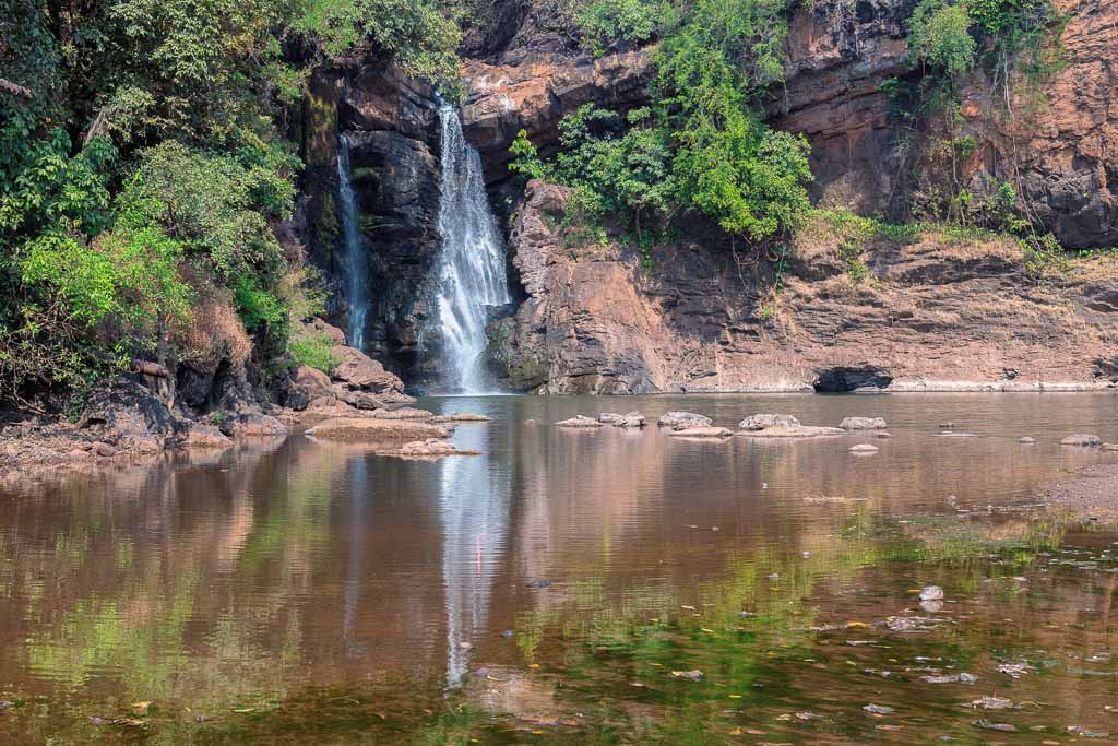 Arvalem Waterfall in Goa, india. Popularly known as the Harvalem Waterfalls, it is located at Arvalem, around 9 km from Bicholim, North Goa.