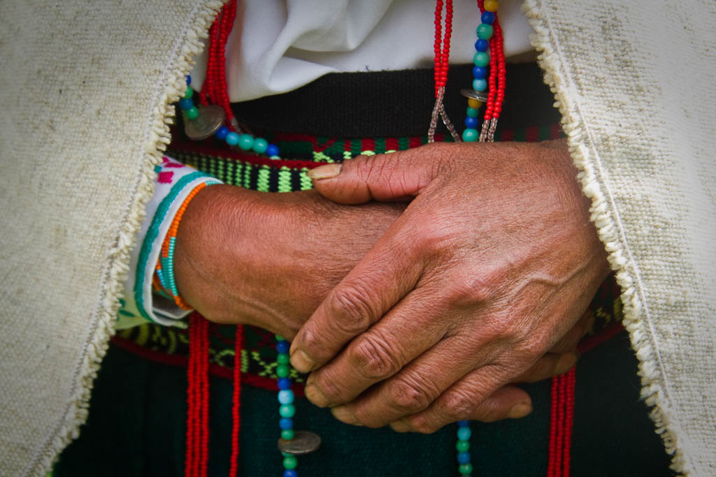 Closeup of an indigenous woman's hands together, Chimborazo, Ecuador