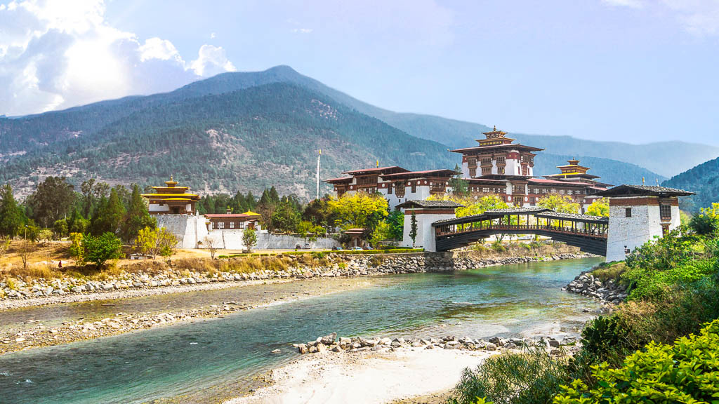 The Punakha Dzong Monastery and bridge across the river in Bhutan Asia one of the largest monestary in Asia with the landscape and mountains background, Punakha,Bhutan