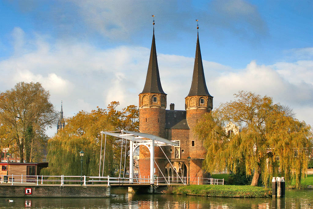 Netherlands - Delft - The high spires and brick gothic of Eastern gate (Oostpoort), the only survived city gate, along with its drawbridge